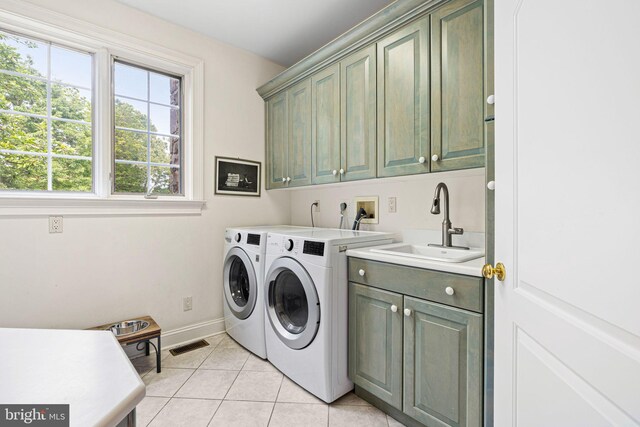 1214 Hunt Seat Dr, Lower Gwynedd, PA 19002 - laundry room featuring cabinet space, washer and dryer, and light tile patterned floors