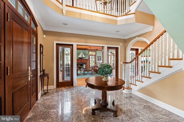 1214 Hunt Seat Dr, Lower Gwynedd, PA 19002 - entryway with ornamental molding, stairway, a towering ceiling, and marble tiled floors