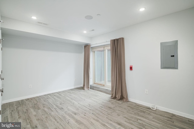 1524 N 8th St Unit 1, Philadelphia, PA 19122 - unfurnished room with electric panel, light wood finished floors, baseboards, and recessed lighting