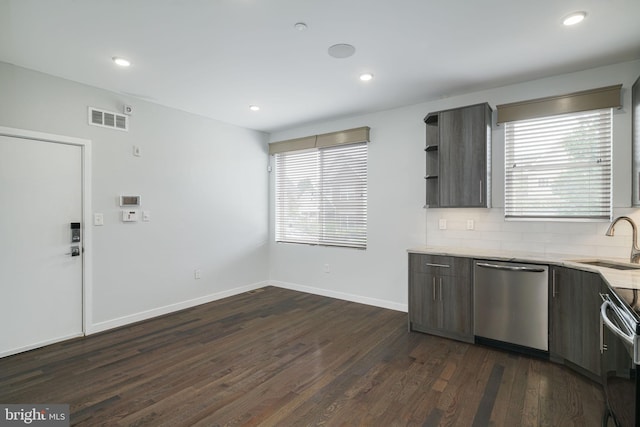 1524 N 8th St Unit 1, Philadelphia, PA 19122 - kitchen featuring stainless steel appliances, a sink, dark wood finished floors, open shelves, and baseboards