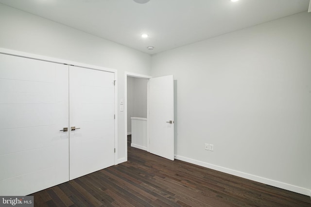 1524 N 8th St Unit 1, Philadelphia, PA 19122 - unfurnished bedroom featuring dark wood-style floors, baseboards, recessed lighting, and a closet