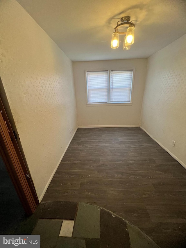 1206 Lakeshore Dr, Camden, NJ 08104 - empty room with baseboards and dark wood-type flooring