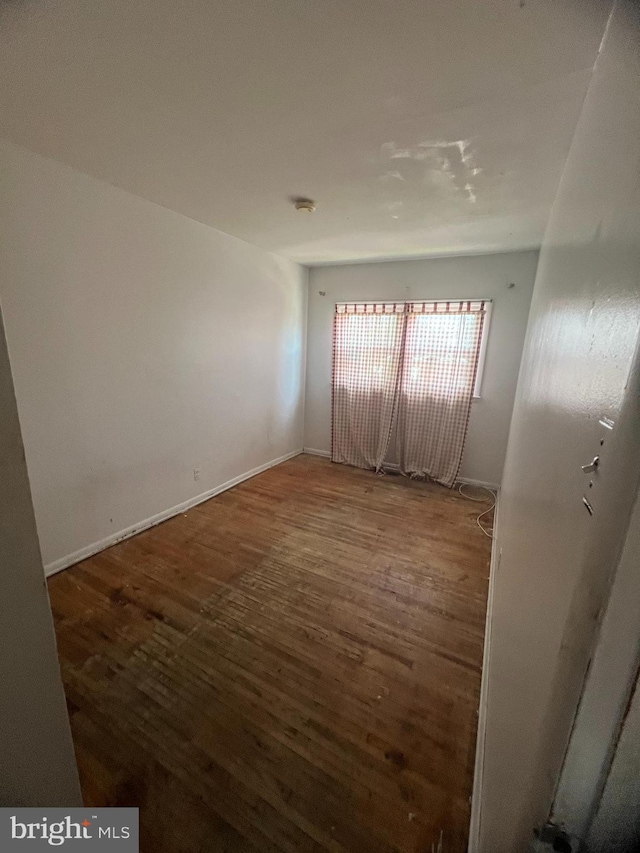 1206 Lakeshore Dr, Camden, NJ 08104 - unfurnished room with wood finished floors and baseboards