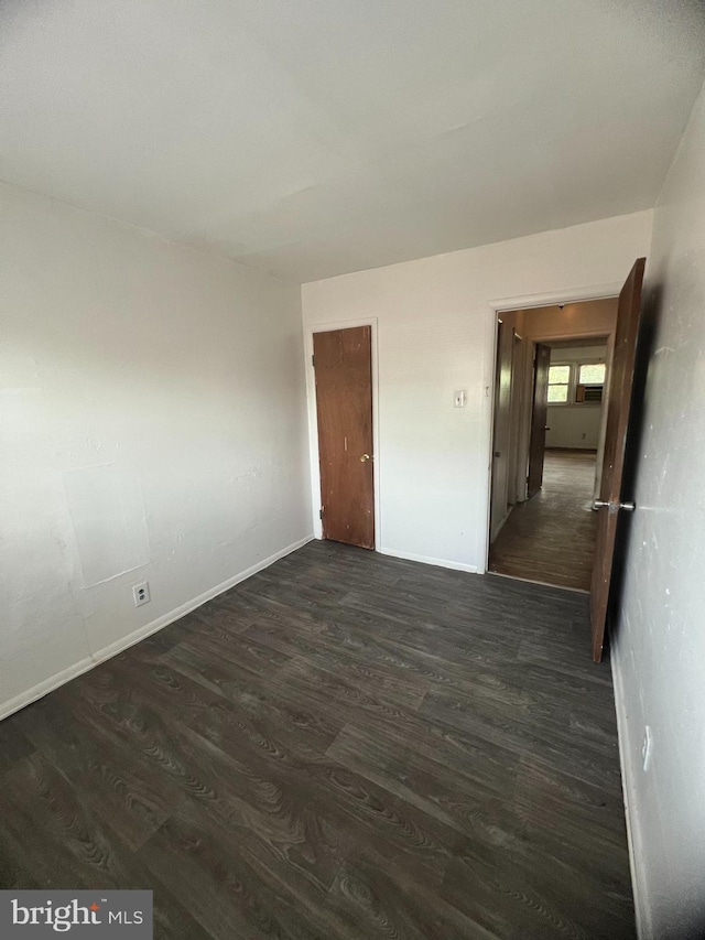 1206 Lakeshore Dr, Camden, NJ 08104 - empty room with dark wood-style floors and baseboards