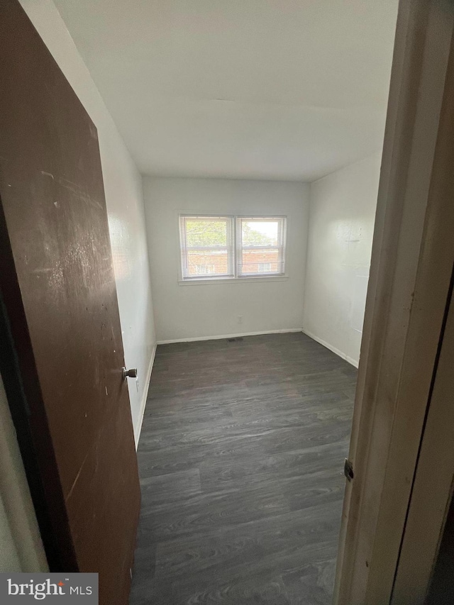 1206 Lakeshore Dr, Camden, NJ 08104 - empty room with dark wood finished floors and baseboards