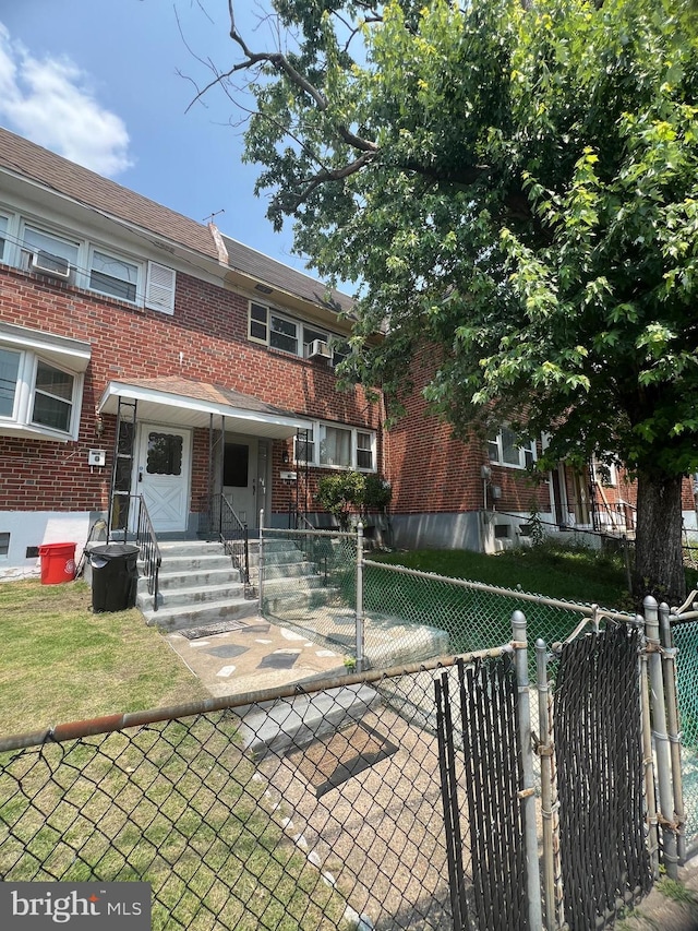 1206 Lakeshore Dr, Camden, NJ 08104 - view of front of home featuring brick siding and a gate