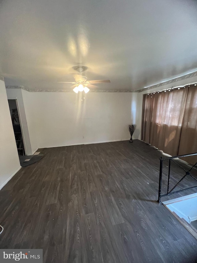 1206 Lakeshore Dr, Camden, NJ 08104 - unfurnished living room with dark wood-style floors and ceiling fan