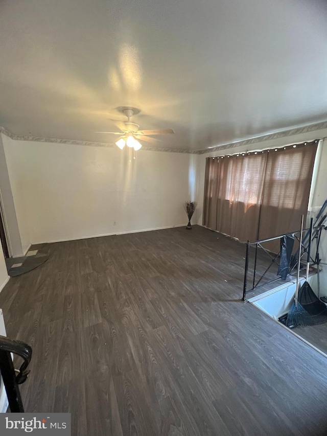 1206 Lakeshore Dr, Camden, NJ 08104 - unfurnished living room featuring dark wood finished floors and a ceiling fan