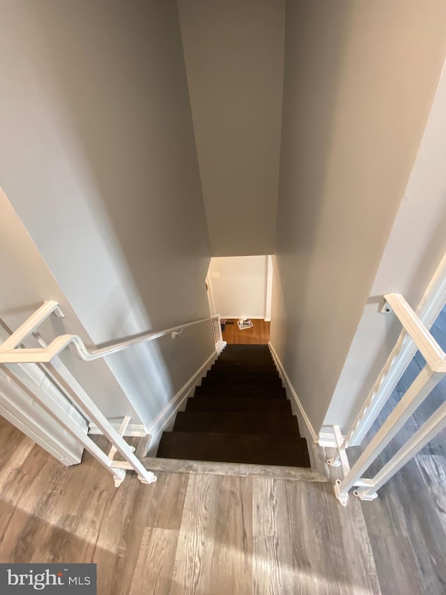 3200 Foothill St, Woodbridge, VA 22192 - stairs featuring wood finished floors and baseboards