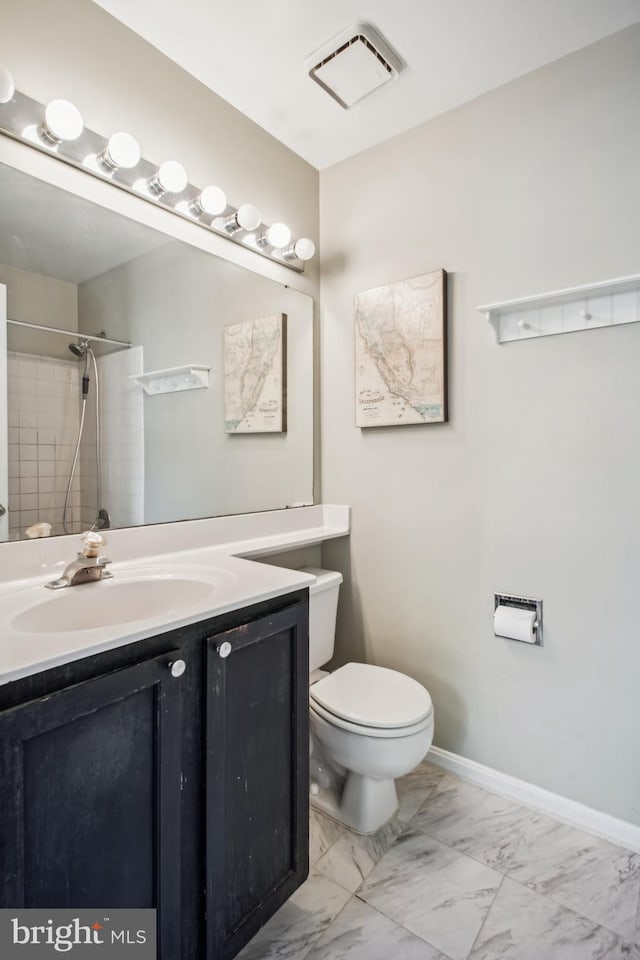 13536 Ruddy Duck Rd, Clifton, VA 20124 - bathroom featuring marble look tile flooring, vanity, and a shower