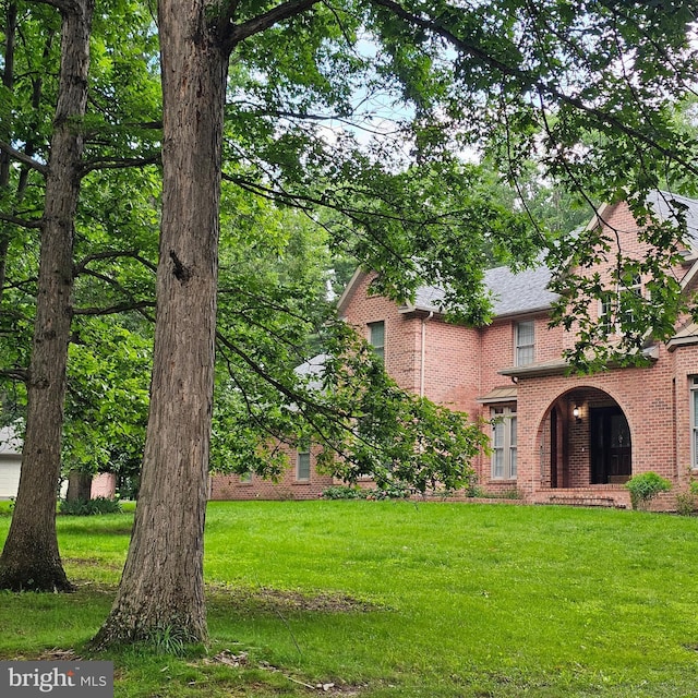 681 Hillcrest Dr, New Creek, WV 26743 - view of front of property featuring brick siding and a front lawn