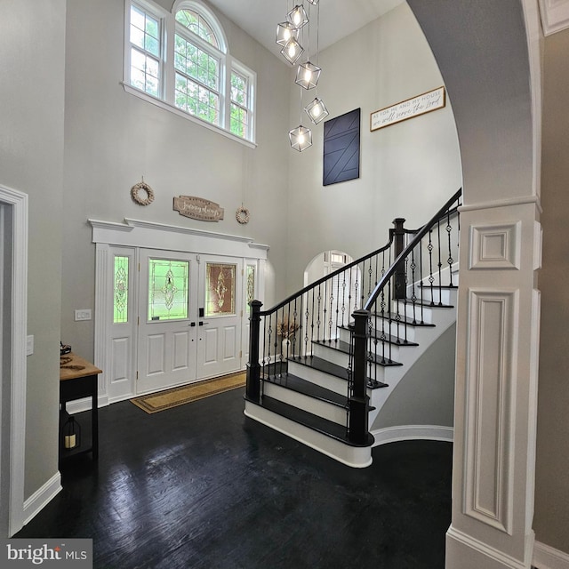 681 Hillcrest Dr, New Creek, WV 26743 - entryway featuring a high ceiling, arched walkways, and stairway