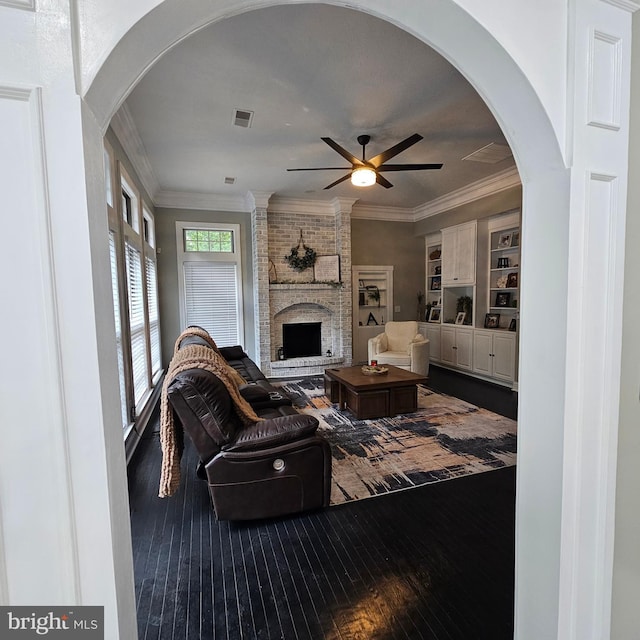 681 Hillcrest Dr, New Creek, WV 26743 - living area featuring a ceiling fan, wood-type flooring, crown molding, and a brick fireplace