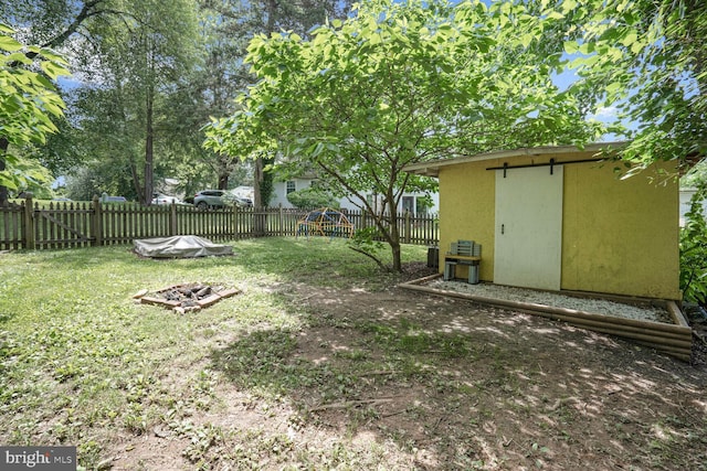 6212 Centaurus Ct, Burke, VA 22015 - fenced backyard featuring a fire pit and a shed