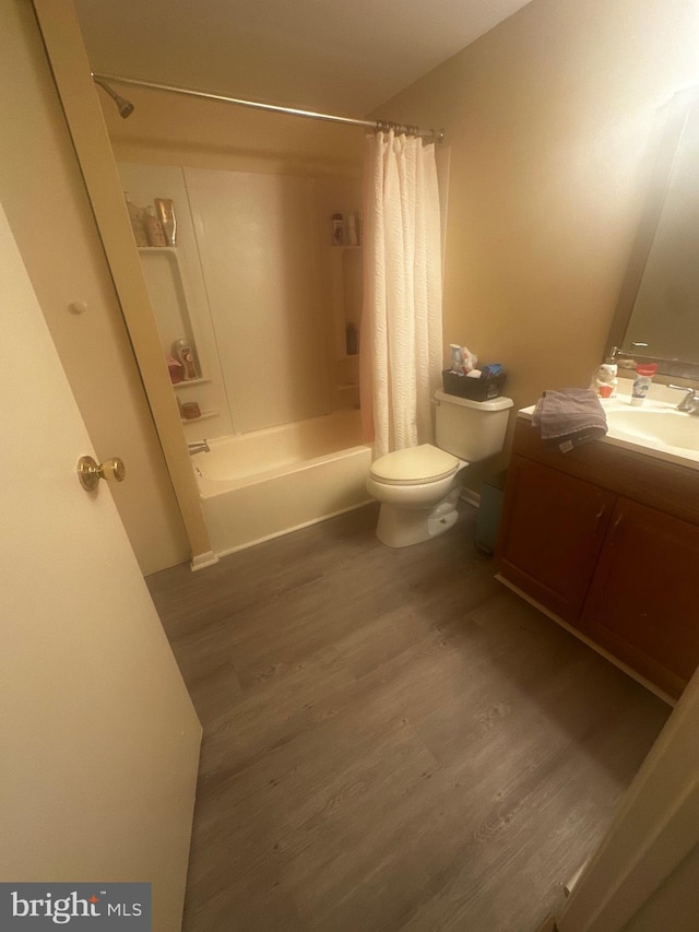 2005 Magnolia Woods Ct Unit F, Edgewood, MD 21040 - bathroom with wood finished floors, toilet, vanity, and shower / tub combo with curtain
