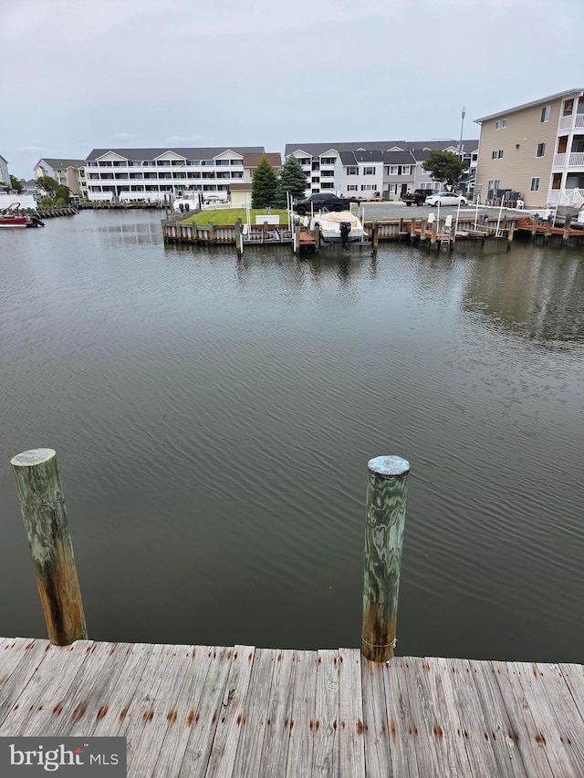 156 Captains Quarters Rd, Ocean City, MD 21842 - dock featuring a water view and a residential view