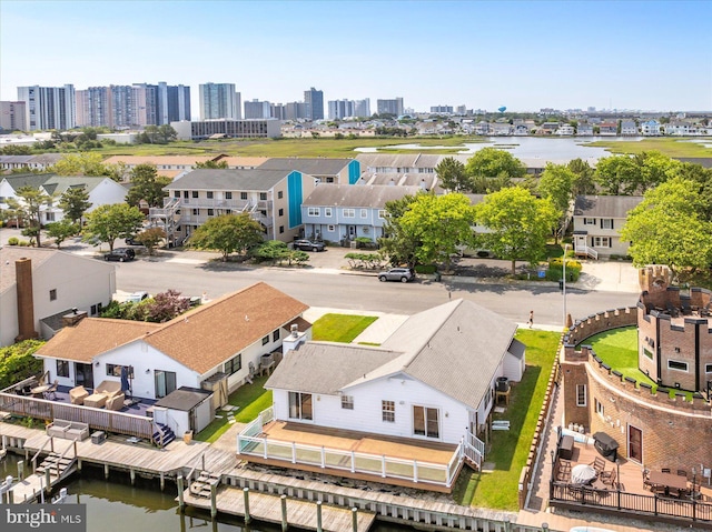 156 Captains Quarters Rd, Ocean City, MD 21842 - aerial view of residential area featuring a nearby body of water and city skyline