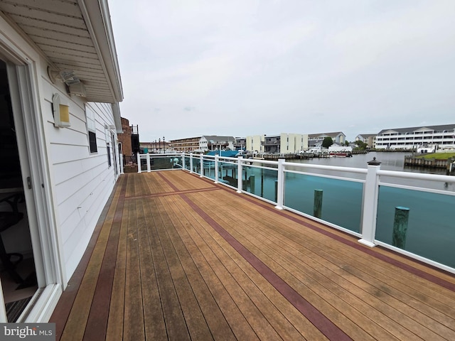156 Captains Quarters Rd, Ocean City, MD 21842 - wooden deck featuring a water view