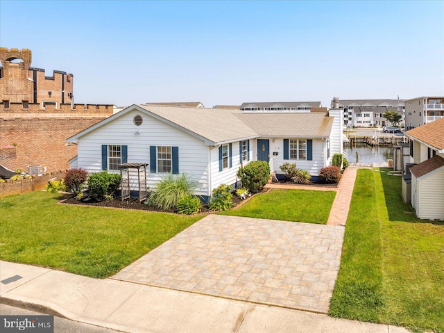 156 Captains Quarters Rd, Ocean City, MD 21842 - view of front of home with a front yard and a water view