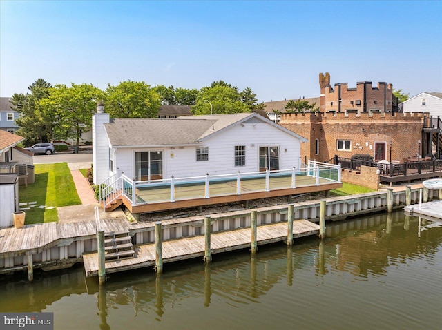 156 Captains Quarters Rd, Ocean City, MD 21842 - back of property featuring a deck with water view and a chimney