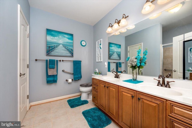 8607 Wintergreen Ct Unit 204, Odenton, MD 21113 - full bath with double vanity, an enclosed shower, toilet, baseboards, and tile patterned flooring
