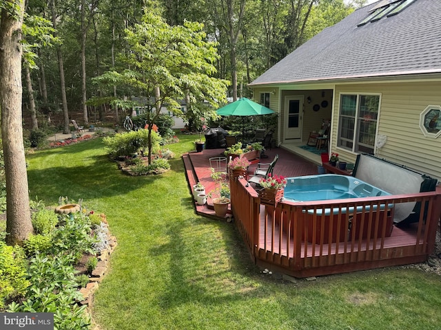 128 Rowan Ct, Manahawkin, NJ 08050 - view of grassy yard with a hot tub and a wooden deck