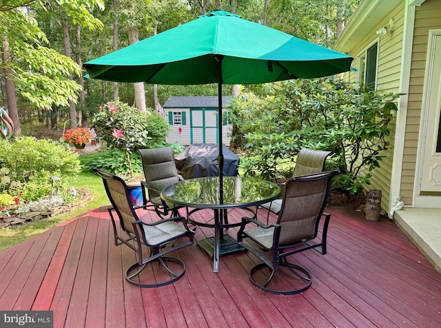 128 Rowan Ct, Manahawkin, NJ 08050 - wooden deck with a storage shed, outdoor dining area, and a grill