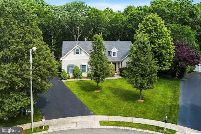 128 Rowan Ct, Manahawkin, NJ 08050 - view of front facade featuring a front lawn