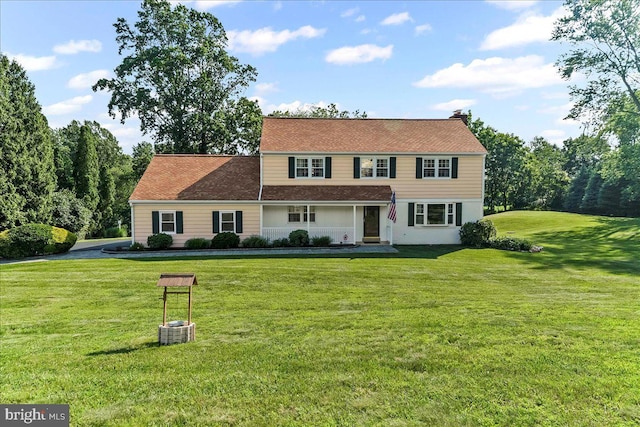 16 Judith Ln, Thornton, PA 19373 - view of front of property featuring a front lawn and a chimney