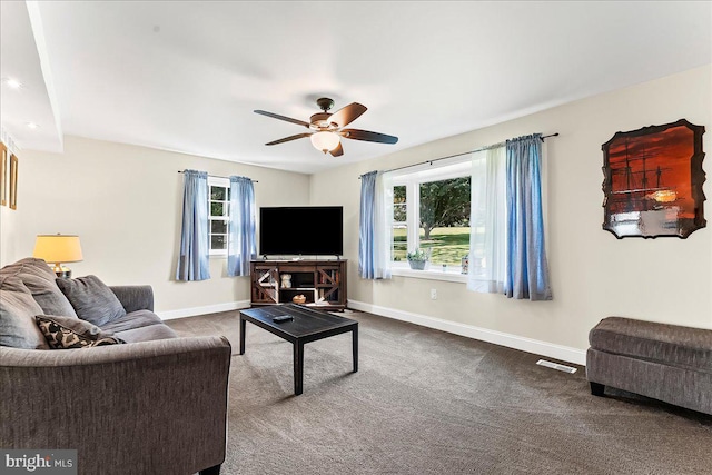 16 Judith Ln, Thornton, PA 19373 - living area with plenty of natural light, dark colored carpet, and ceiling fan
