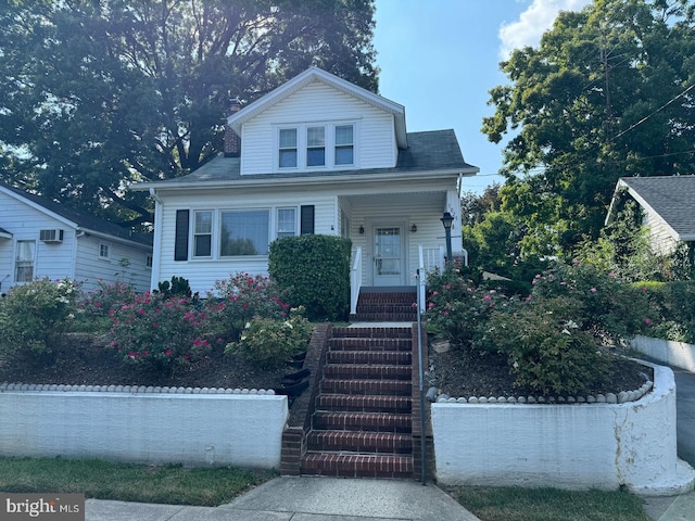 1029 Pennsylvania Ave, Hagerstown, MD 21742 - bungalow-style home featuring a porch and stairway