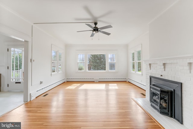 1029 Pennsylvania Ave, Hagerstown, MD 21742 - unfurnished living room featuring wood finished floors, a ceiling fan, and a baseboard heating unit