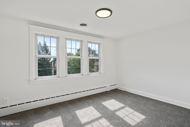 1029 Pennsylvania Ave, Hagerstown, MD 21742 - spare room with healthy amount of natural light, baseboard heating, and carpet flooring