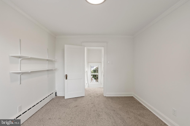 1029 Pennsylvania Ave, Hagerstown, MD 21742 - carpeted empty room with a baseboard heating unit and crown molding