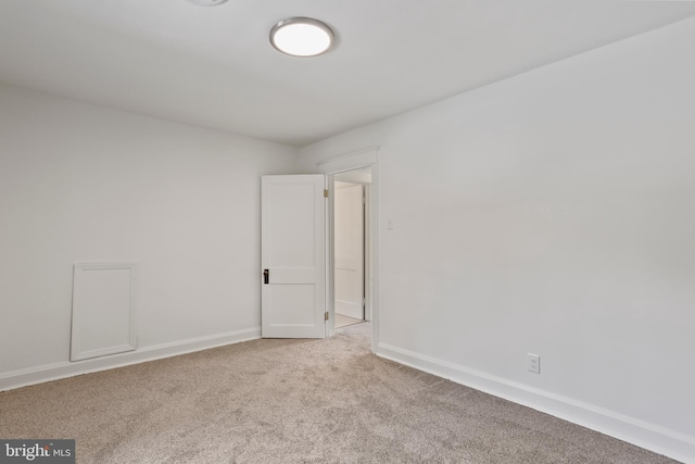1029 Pennsylvania Ave, Hagerstown, MD 21742 - empty room with carpet floors and baseboards