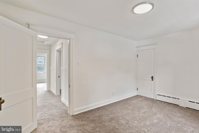 1029 Pennsylvania Ave, Hagerstown, MD 21742 - spare room featuring carpet flooring and a baseboard radiator