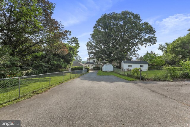 1029 Pennsylvania Ave, Hagerstown, MD 21742 - view of front of property featuring asphalt driveway and a storage shed