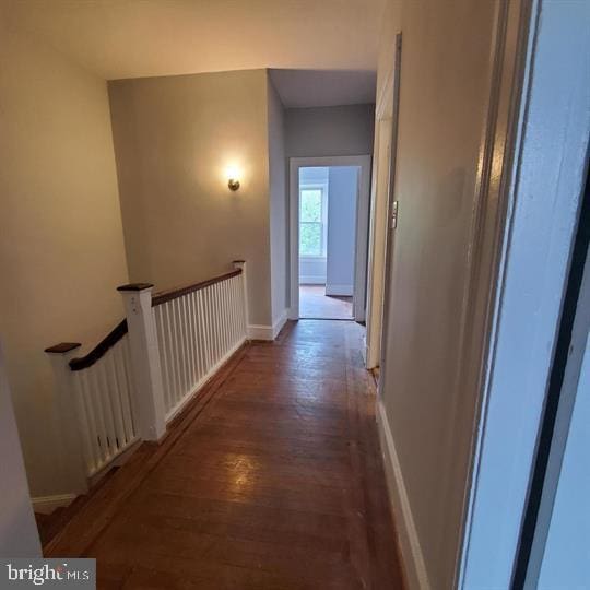 1212 Park Rd NW, Washington, DC 20010 - hallway with wood finished floors and an upstairs landing