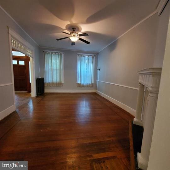 1212 Park Rd NW, Washington, DC 20010 - unfurnished living room featuring ceiling fan, plenty of natural light, wood finished floors, and crown molding