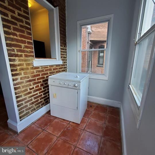 1212 Park Rd NW, Washington, DC 20010 - detailed view of washer / clothes dryer and brick wall