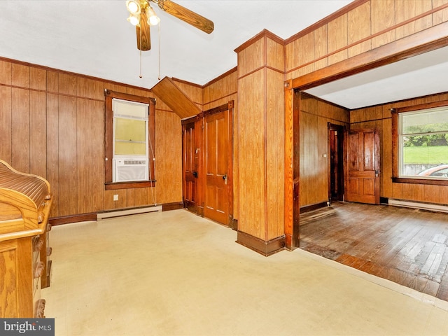 526 W Potomac St, Brunswick, MD 21716 - unfurnished bedroom with wood walls, cooling unit, a baseboard heating unit, and ornamental molding
