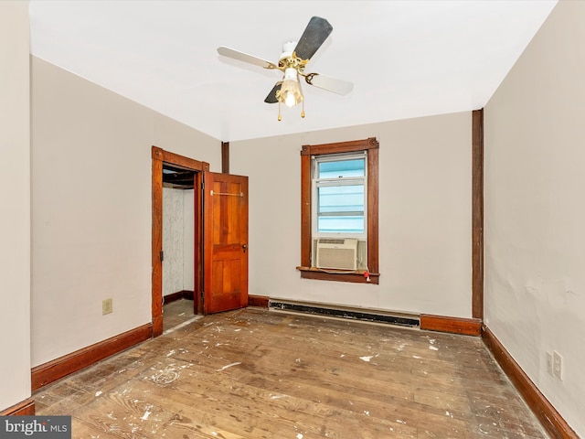 526 W Potomac St, Brunswick, MD 21716 - unfurnished room featuring a baseboard radiator, hardwood / wood-style floors, cooling unit, and ceiling fan