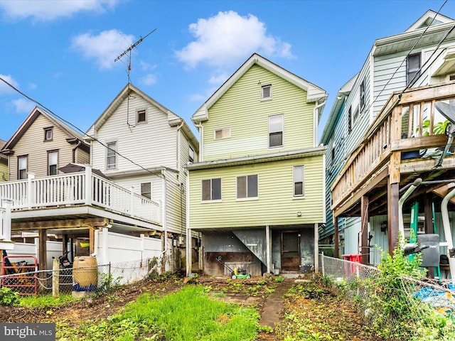 526 W Potomac St, Brunswick, MD 21716 - back of house featuring a fenced backyard and a wooden deck