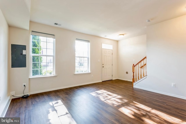 519 Long Wall Dr, Reisterstown, MD 21136 - entrance foyer featuring electric panel, stairs, and wood finished floors