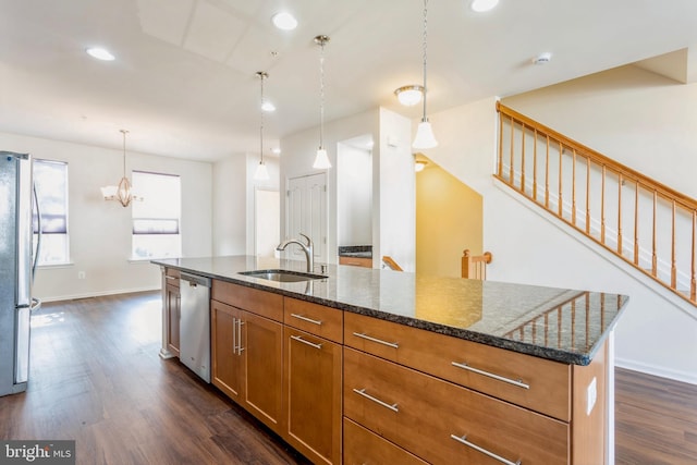 519 Long Wall Dr, Reisterstown, MD 21136 - kitchen featuring appliances with stainless steel finishes, dark wood-style floors, recessed lighting, dark stone countertops, and brown cabinets