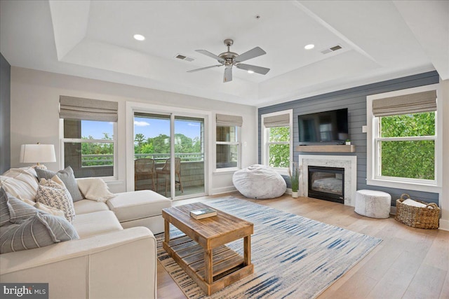 931 Oyster Bay Pl, Solomons, MD 20688 - living area with a raised ceiling, healthy amount of natural light, ceiling fan, wood finished floors, and recessed lighting