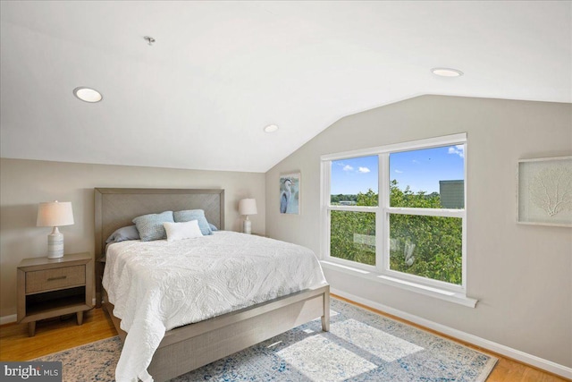 931 Oyster Bay Pl, Solomons, MD 20688 - bedroom featuring lofted ceiling, light wood-type flooring, and recessed lighting