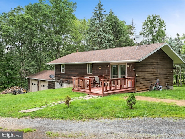 357 Crestview Mountain Rd, Augusta, WV 26704 - view of front of house with a front yard, a wooden deck, roof with shingles, and a detached garage
