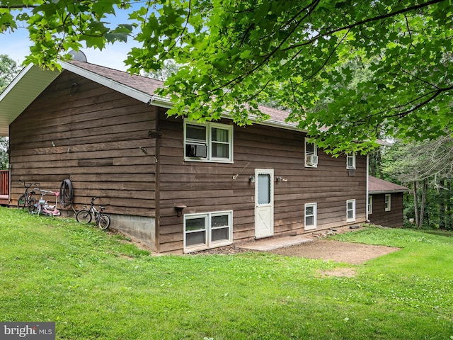357 Crestview Mountain Rd, Augusta, WV 26704 - back of property featuring a yard, cooling unit, and roof with shingles