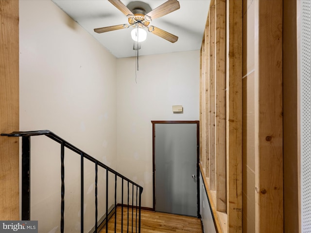 357 Crestview Mountain Rd, Augusta, WV 26704 - staircase featuring wood finished floors, a ceiling fan, and a heating unit